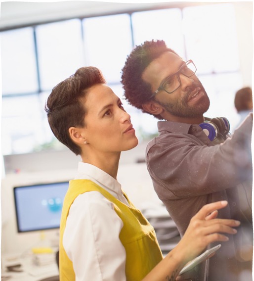 Two colleagues exploring ideas together